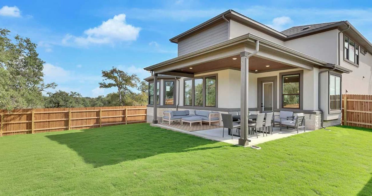 Model home covered patio and backyard